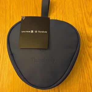 Therabody Navy Carrying Case & Contents - United’s Business Class amenity kit